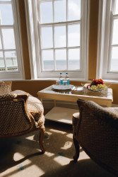 Chairs by window in bedroom