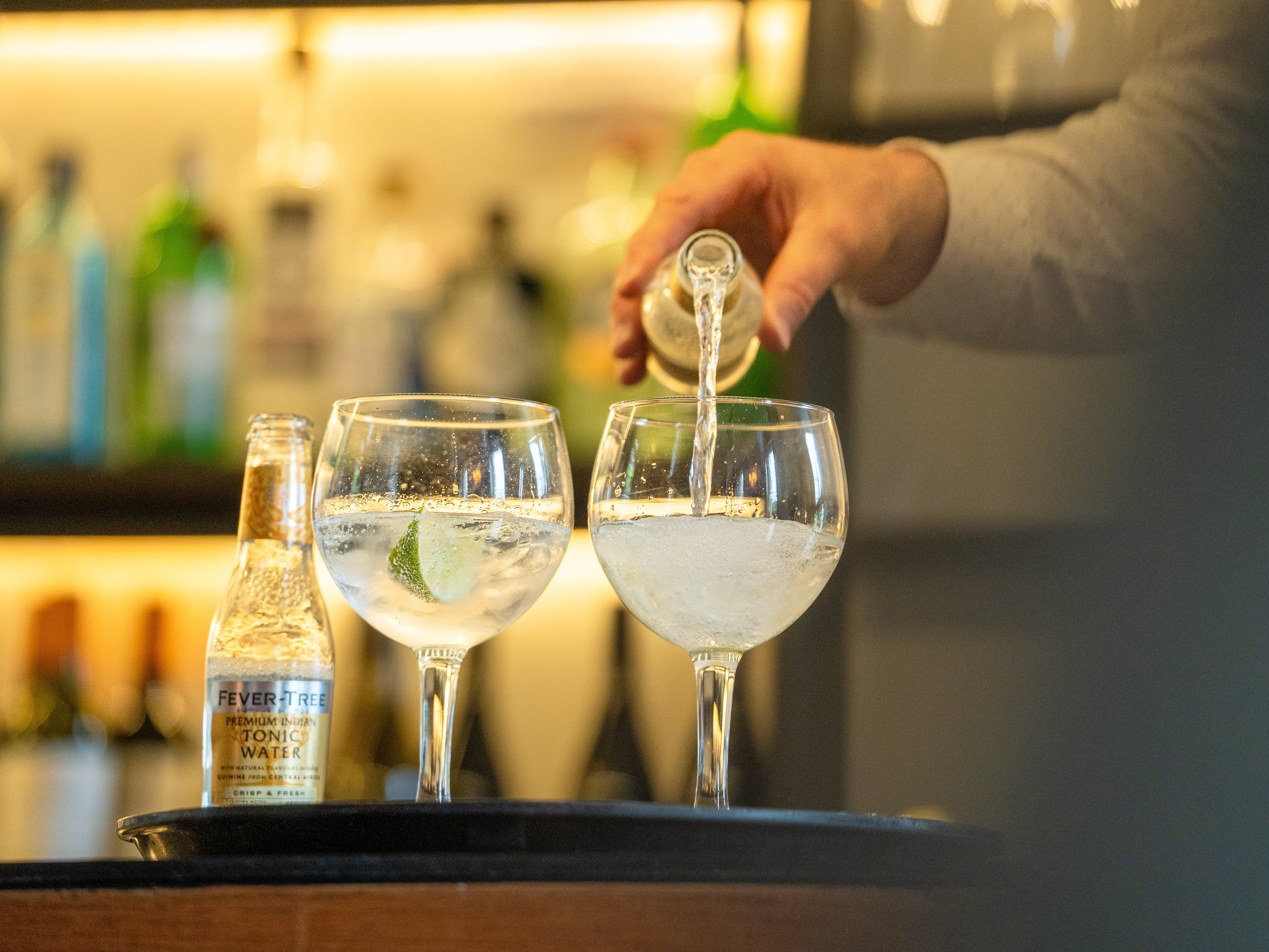 Bartender pouring a drink