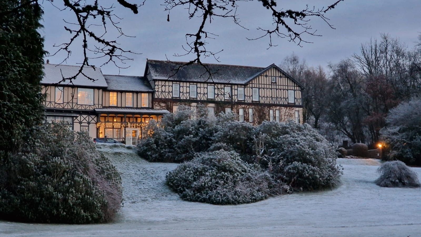 Exterior of the hotel covered in snow