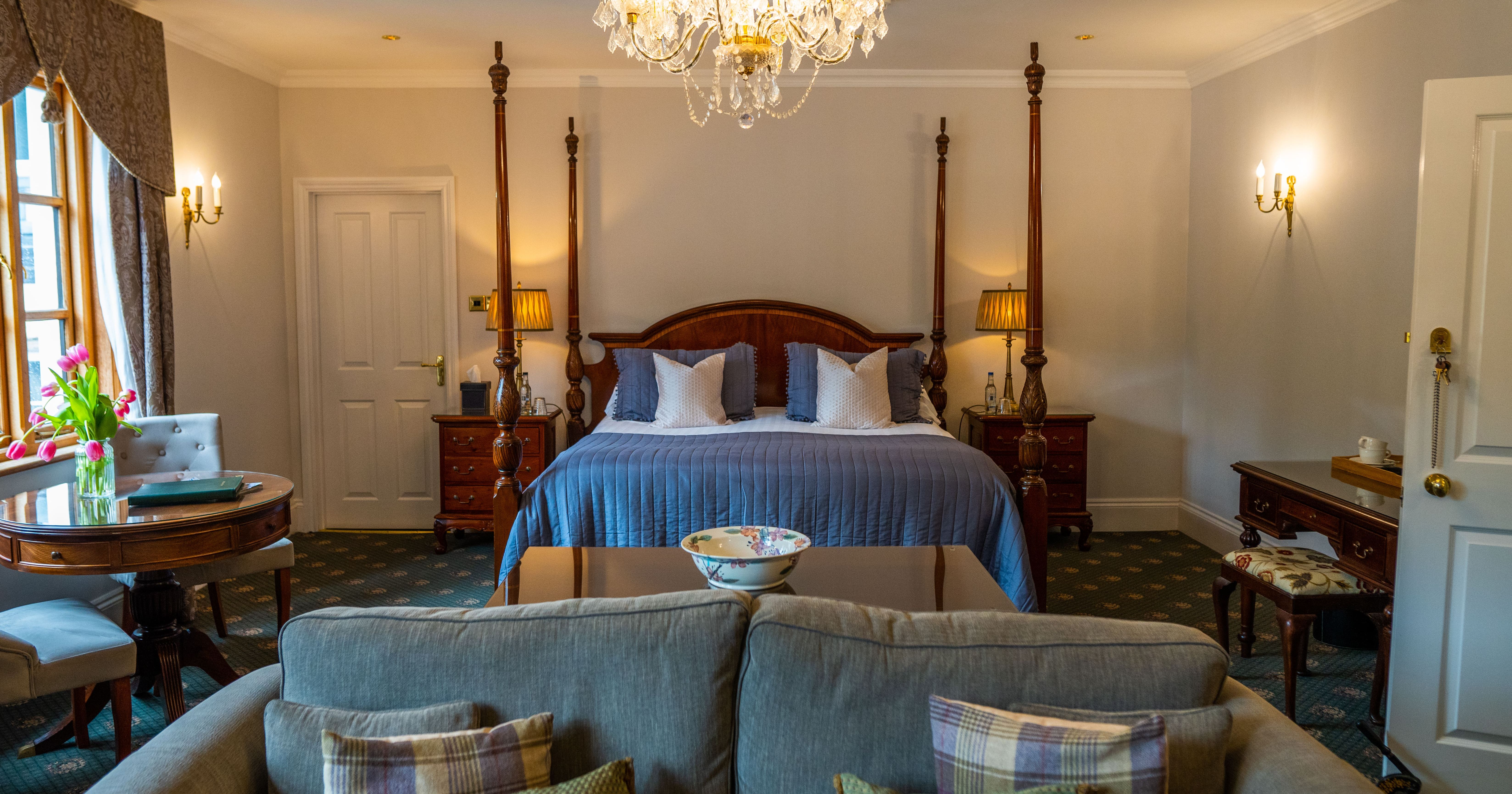View of bed with sofa in front