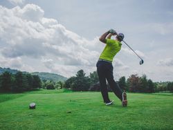 Man playing golf