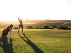 Man playing golf