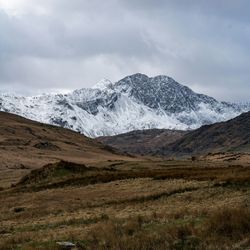 Snowy mountains in welsh countryside