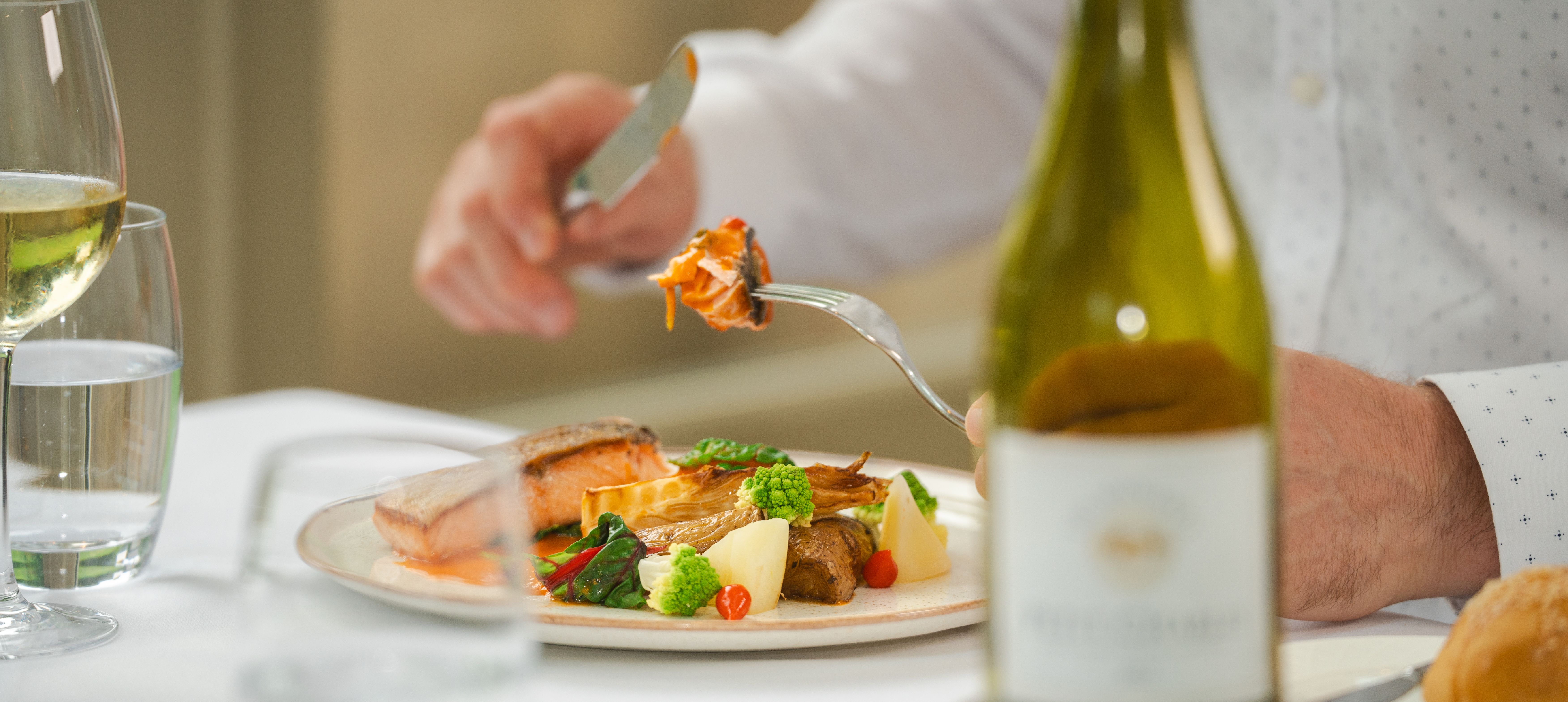Man eating plate of food