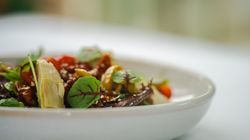 A salad in a white bowl
