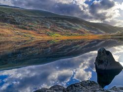 View of welsh valleys with lake in the foreground