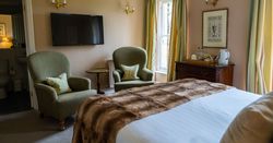 Bed with tartan blanket