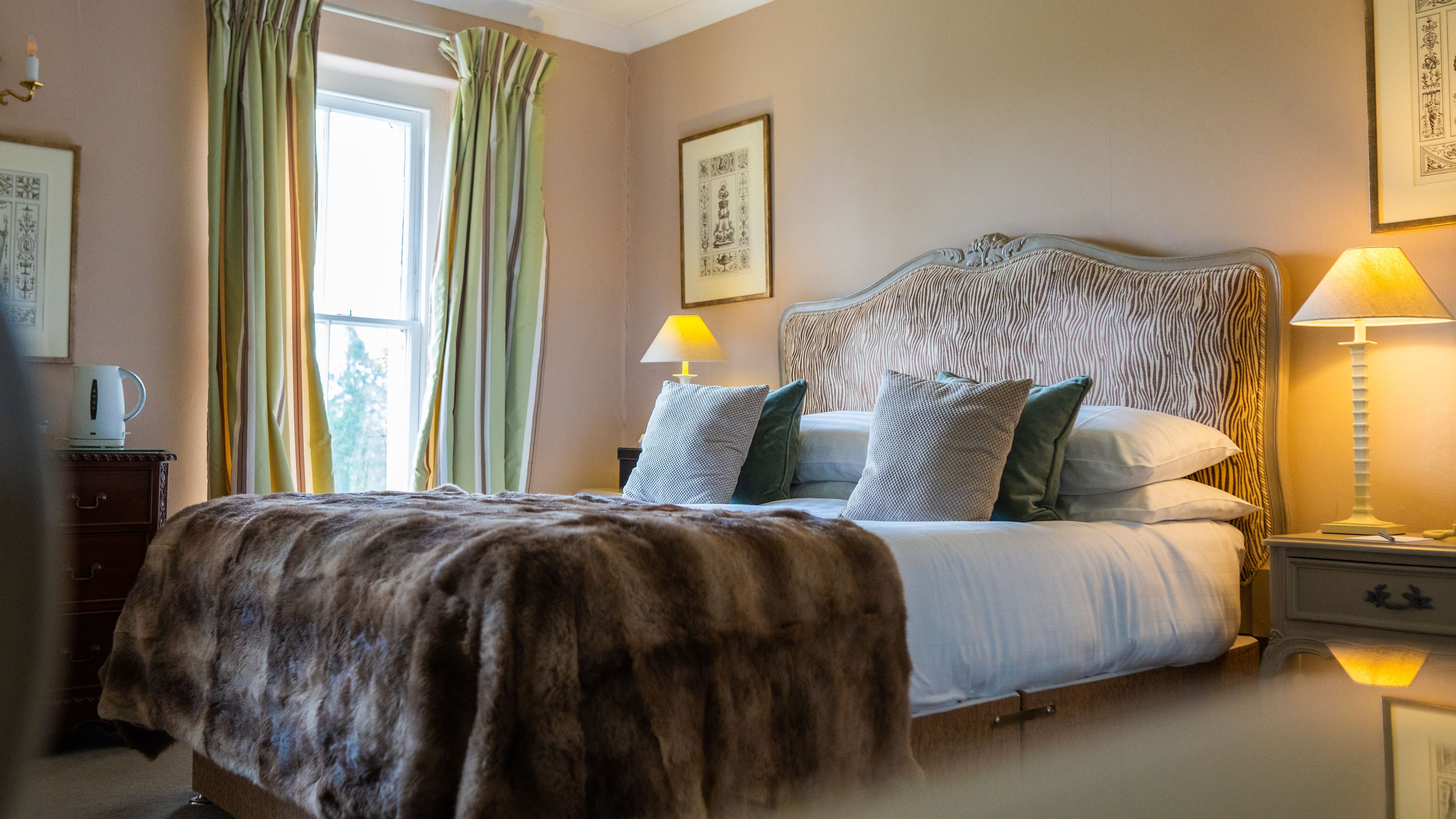 Bed with tartan blanket