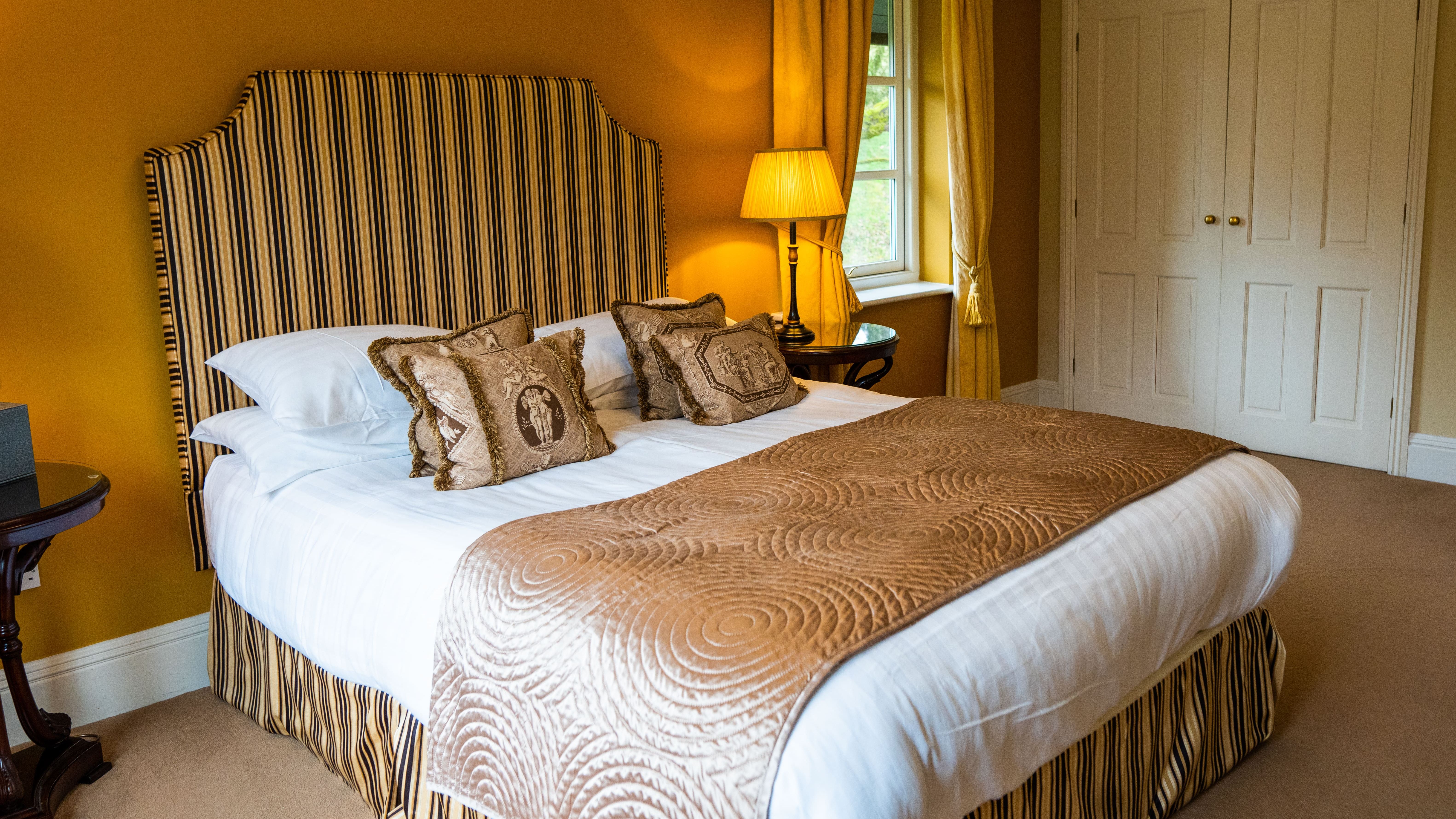 Double bed with gold theme