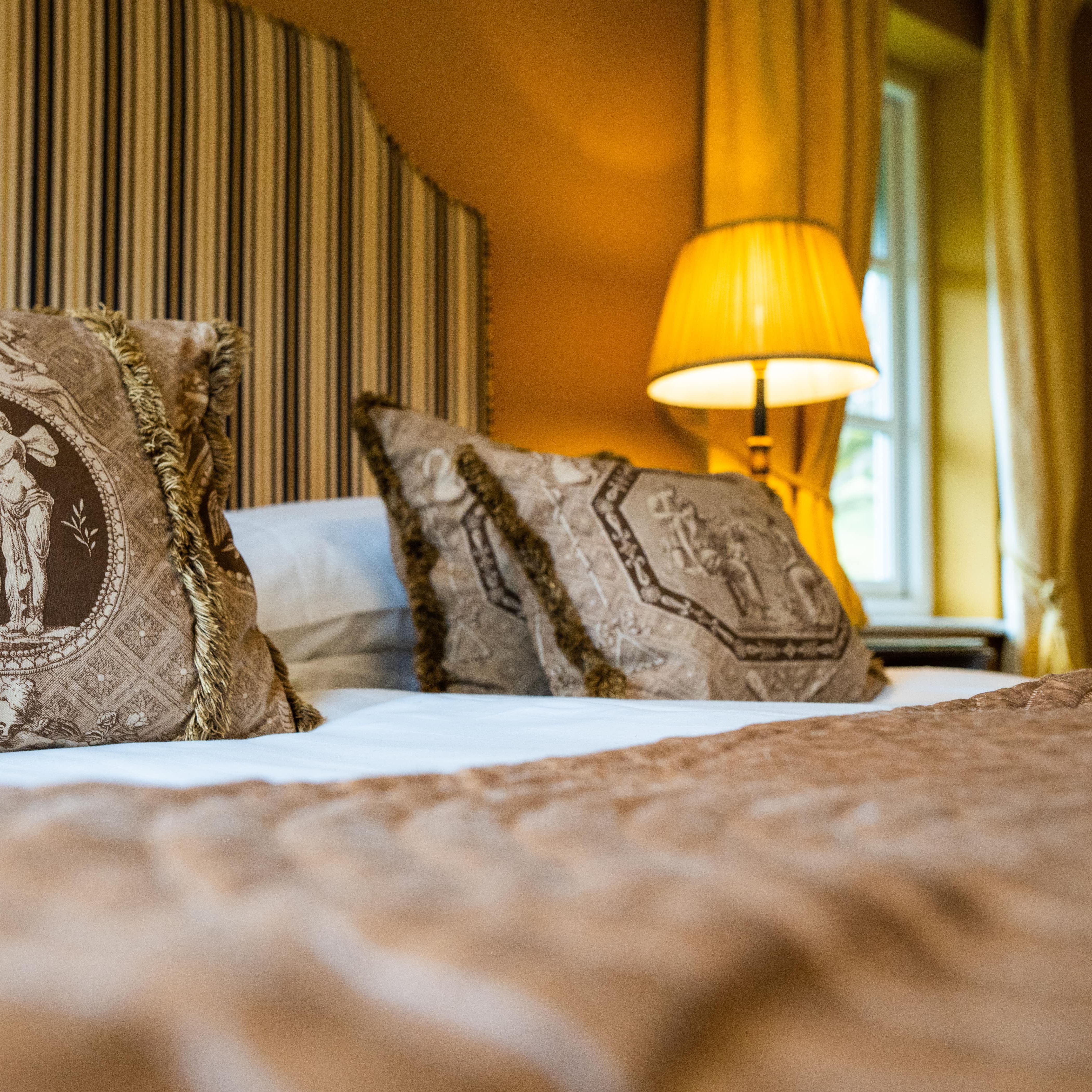 Double bed with gold theme