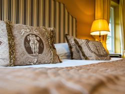 Double bed with gold theme
