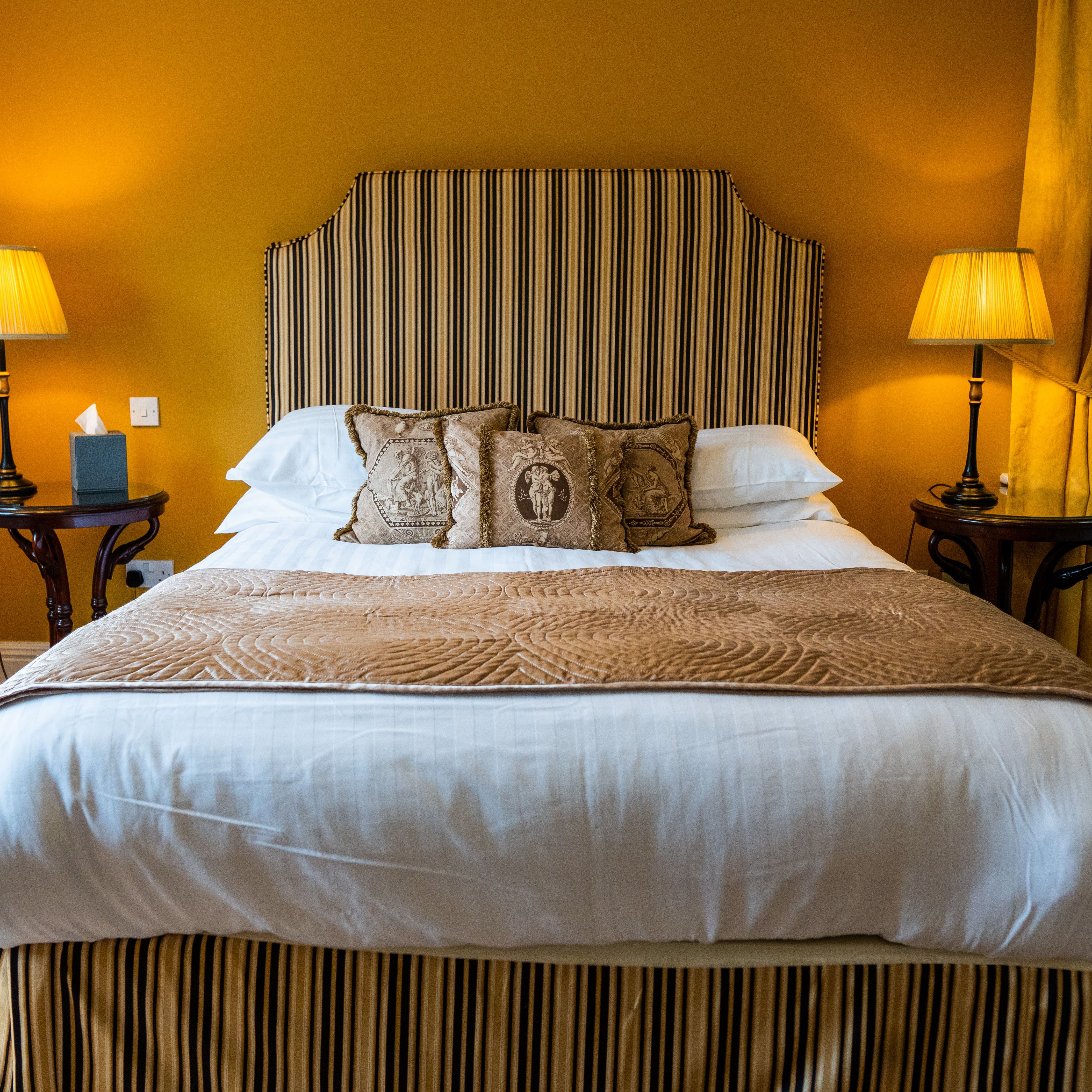 Double bed with gold theme