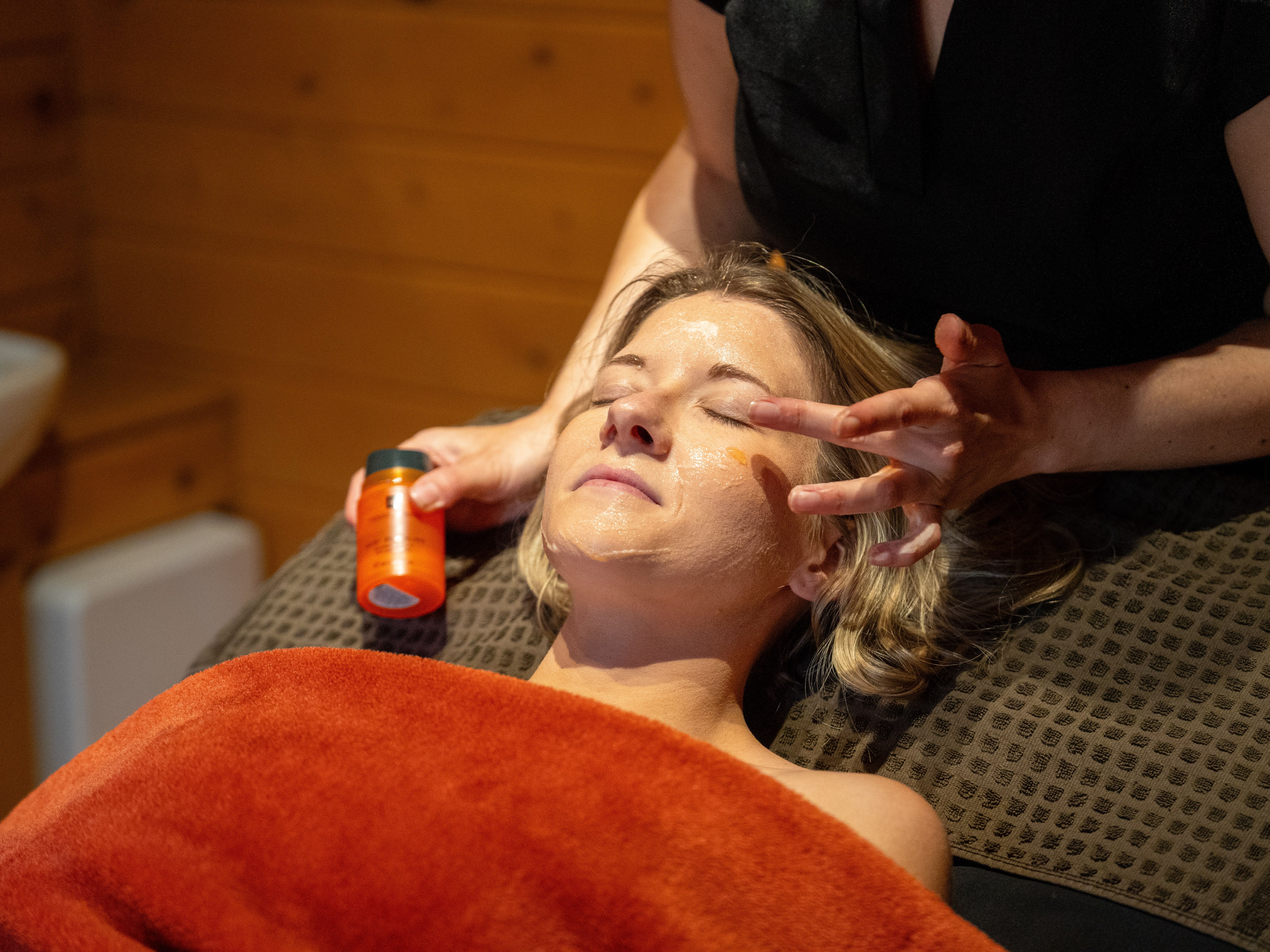 Lady receiving facial treatment