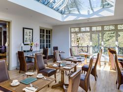 Large dining table prepared for an event
