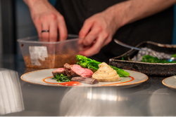 Chef assembling a sunday roast
