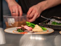 Chef assembling a sunday roast