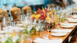 Elegant table setting with floral centerpiece and glassware
