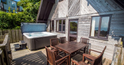 Ocean View Lodge with hot tub and decking with sea views