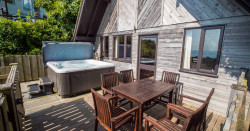 Ocean View Lodge with hot tub and decking with sea views