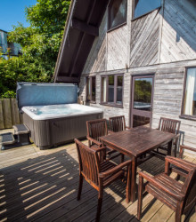 Ocean View Lodge with hot tub and decking with sea views