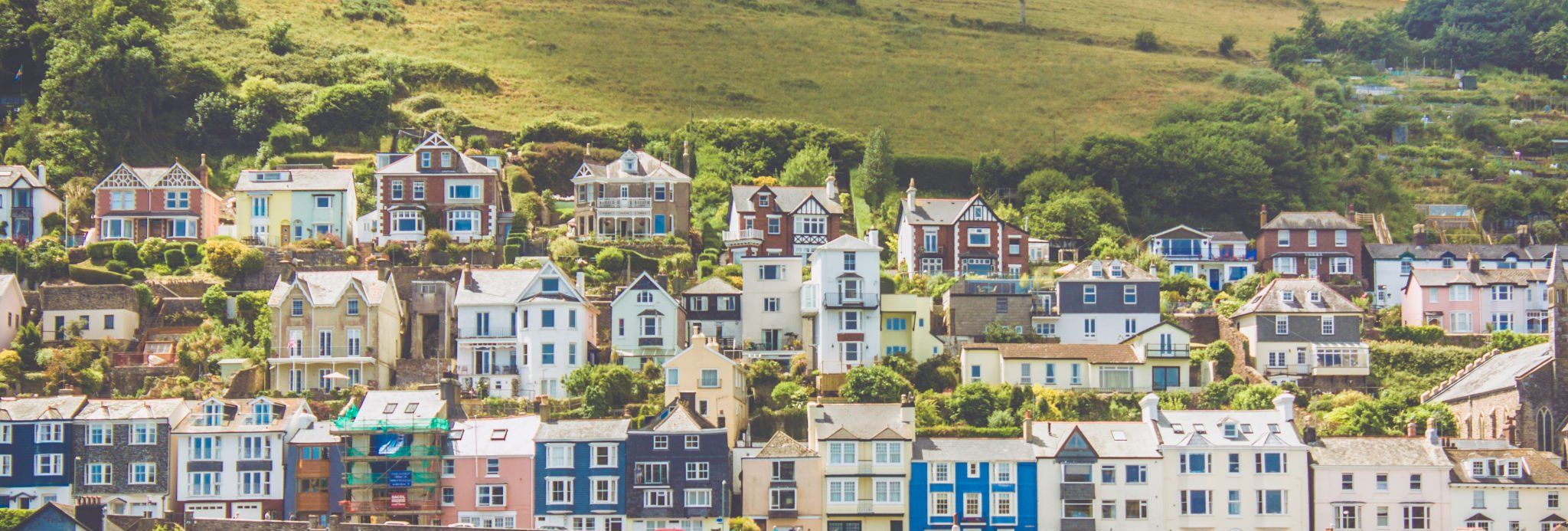 View of the small town of Dartmouth with its colourful house and the harbour.