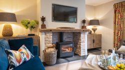 Cozy living room with log burner fireplace and stylish decor