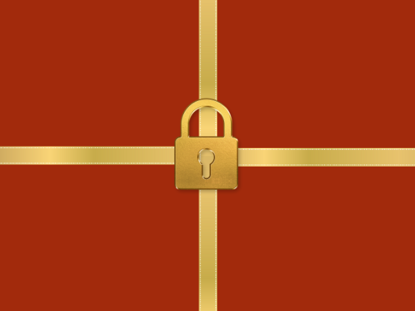 Gold lock on gold ribbon over a red background