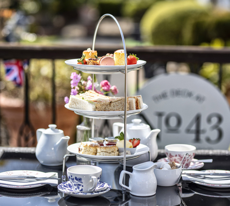 Afternoon tea set up on terrace outside