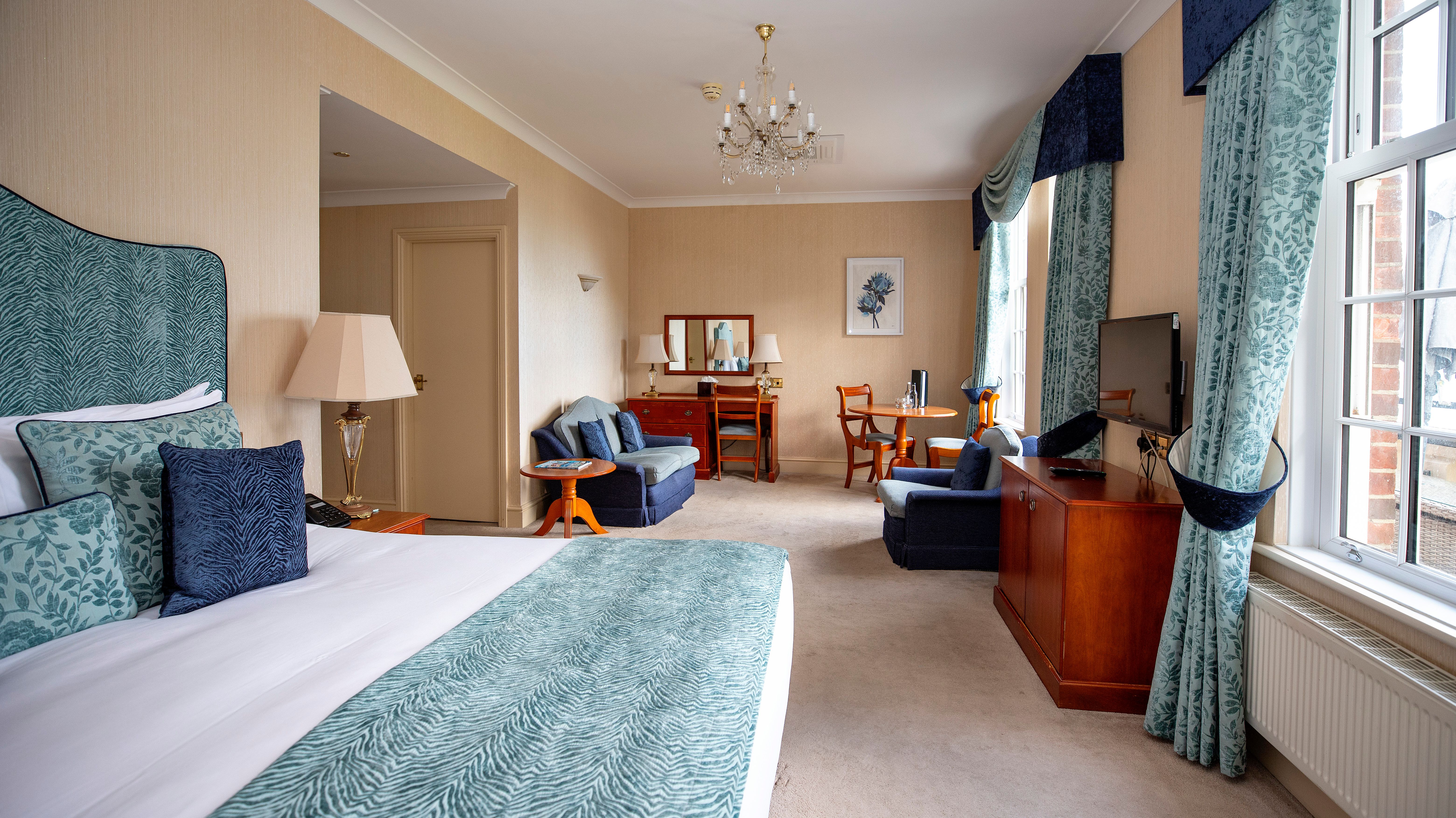 Large bedroom with blue furnishings