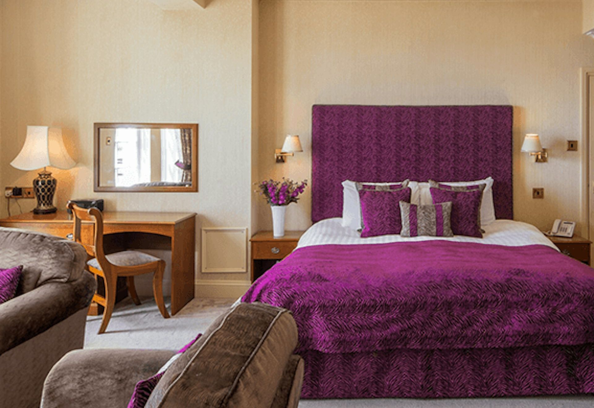 Large bedroom with purple furnishings
