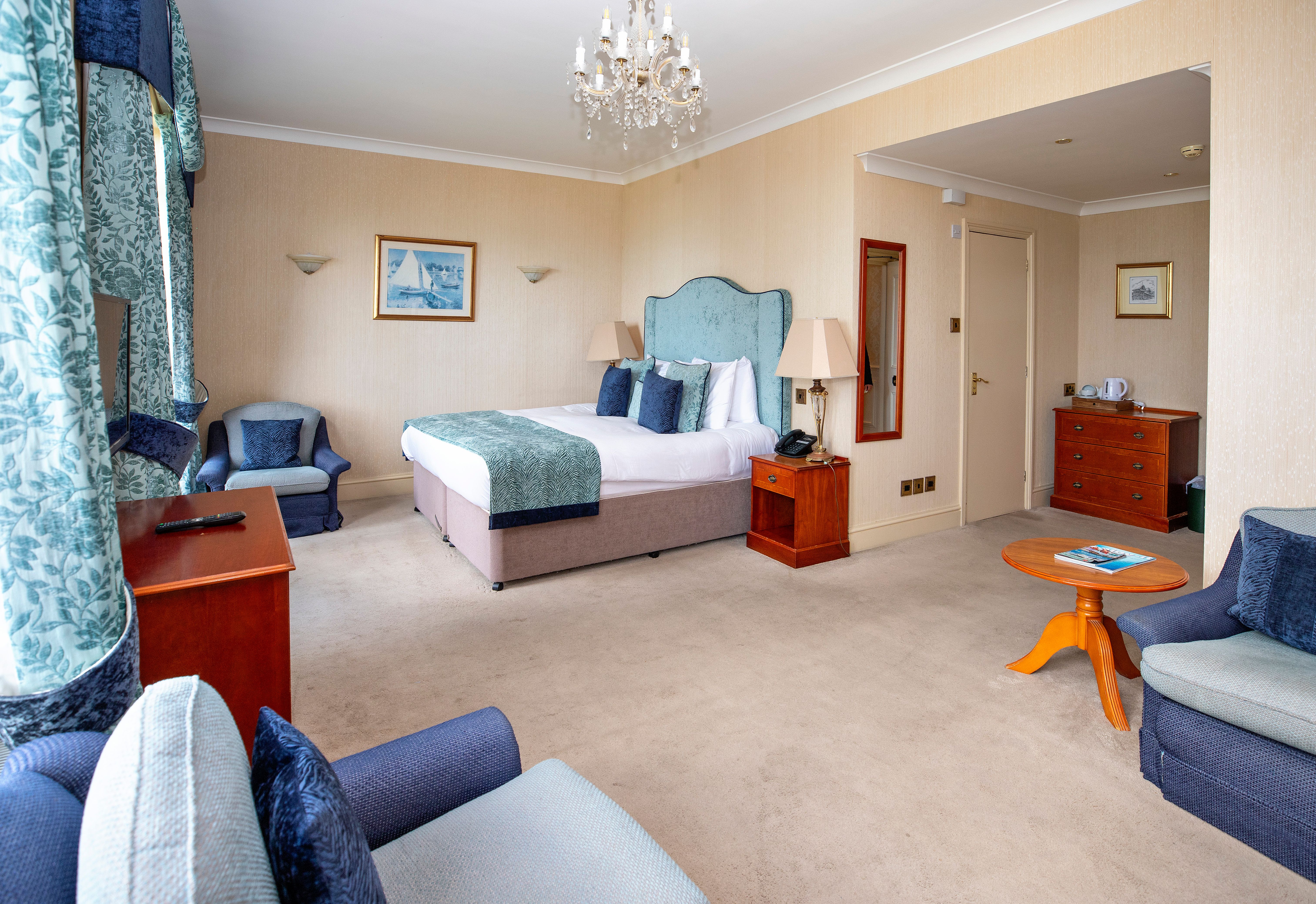 Large bedroom with blue furnishings