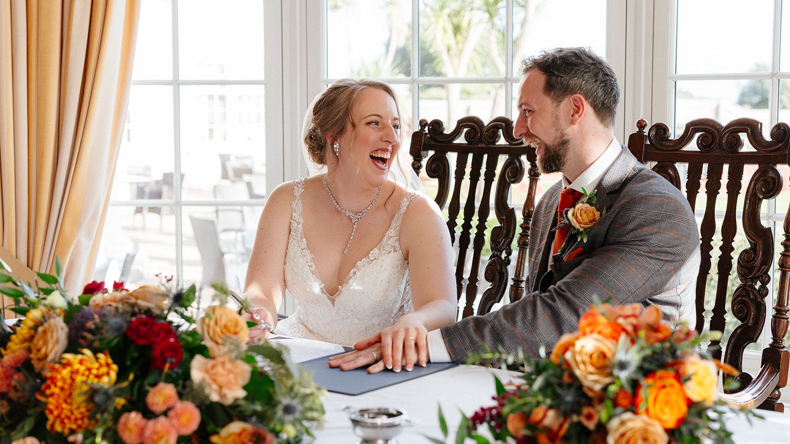Bride and Groom signing the registry