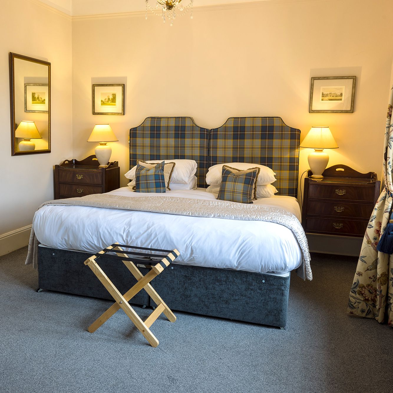 hotel suite with soft lightning and comfortably furnished