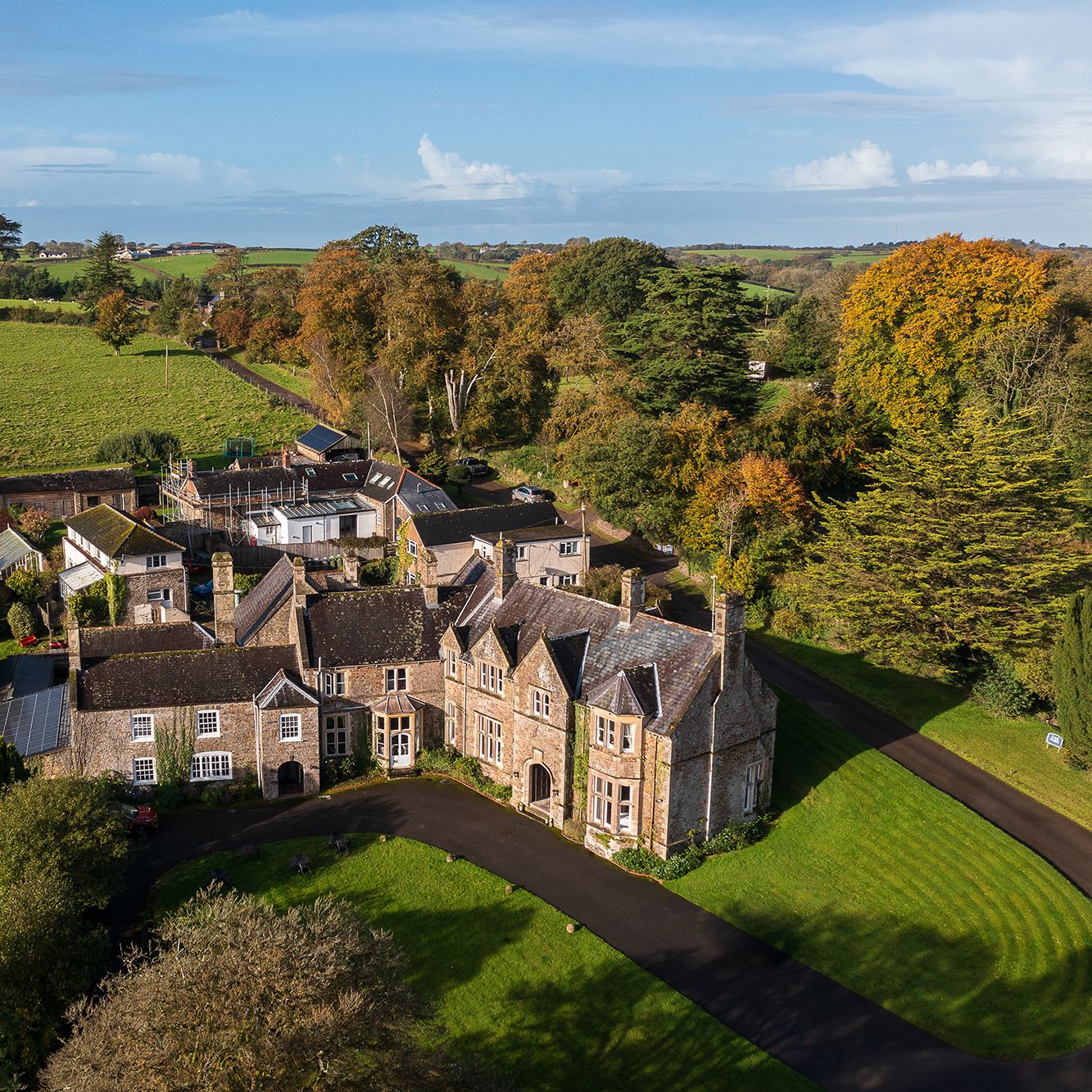 aerial shot of northcote manor house set in the devon countryside