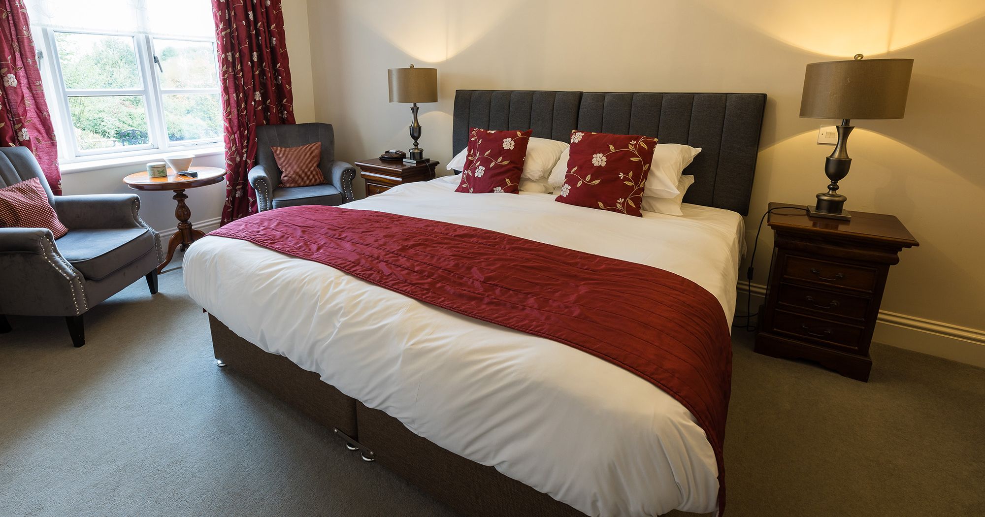 accessible hotel bedroom with elegant styling