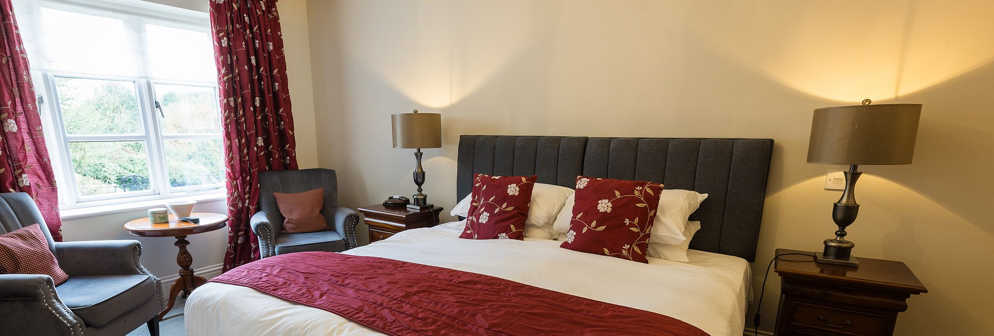 accessible hotel bedroom with elegant styling