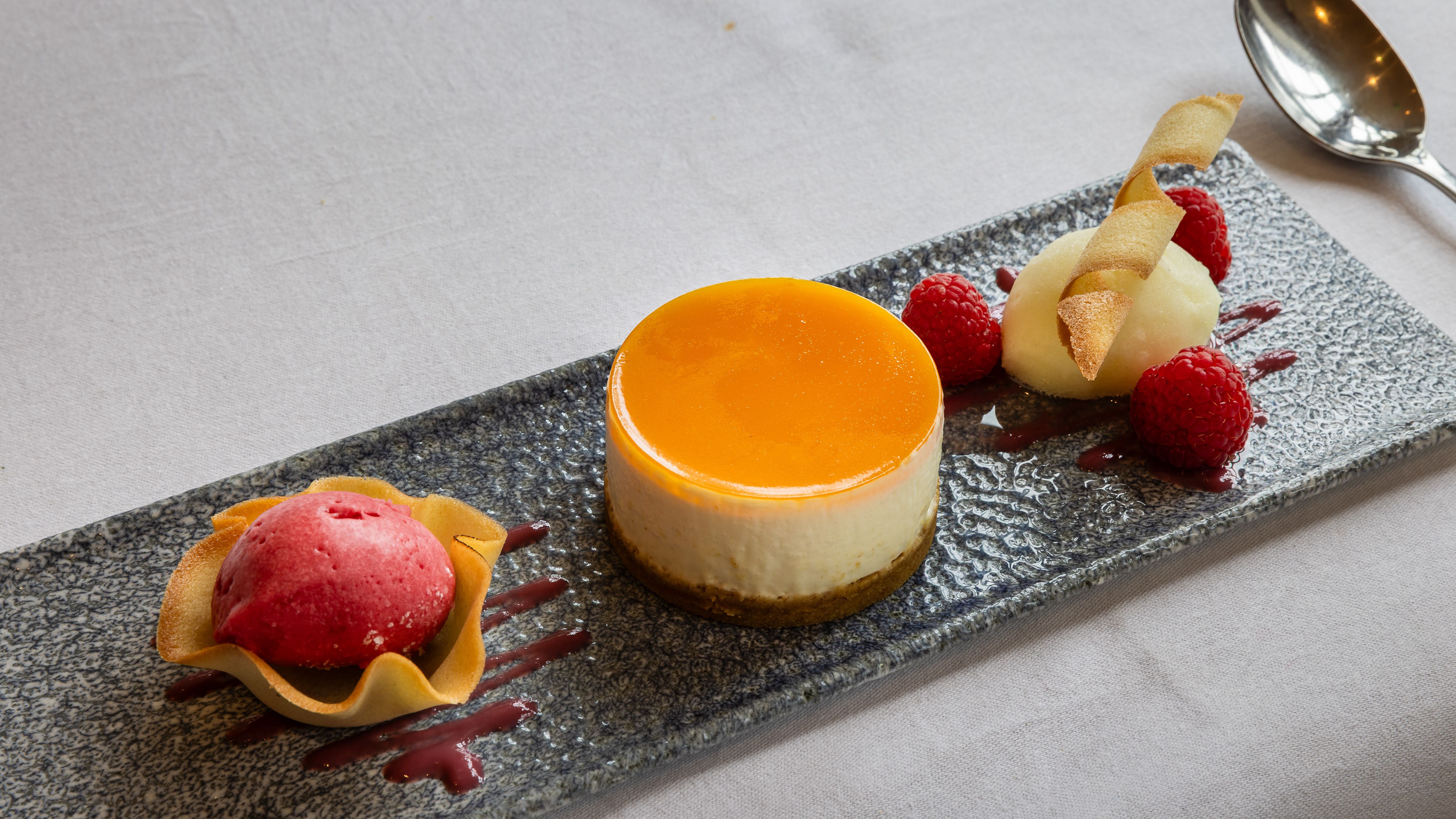Cheesecake on a slate with berries