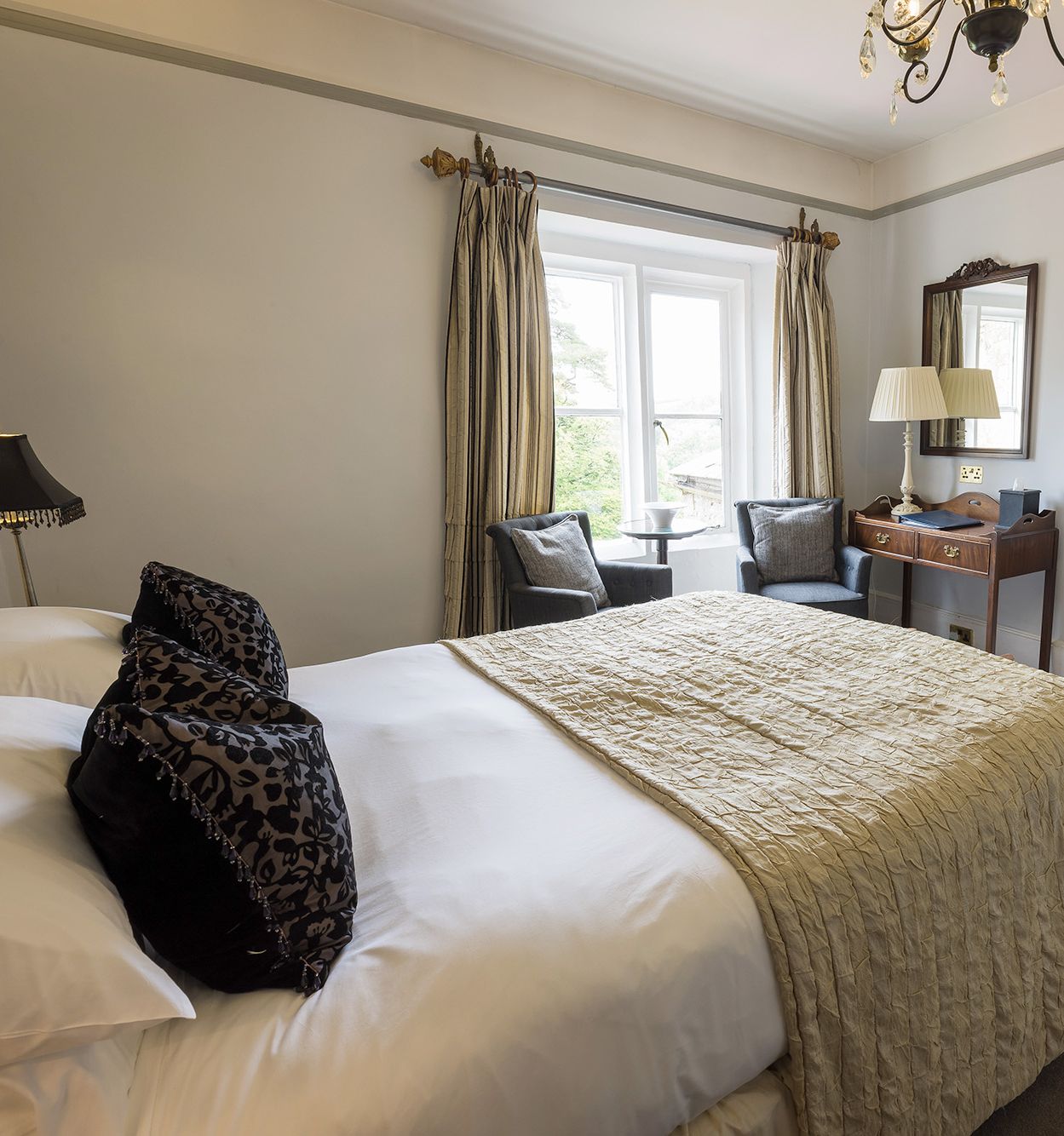 vintage style hotel room with feature fireplace