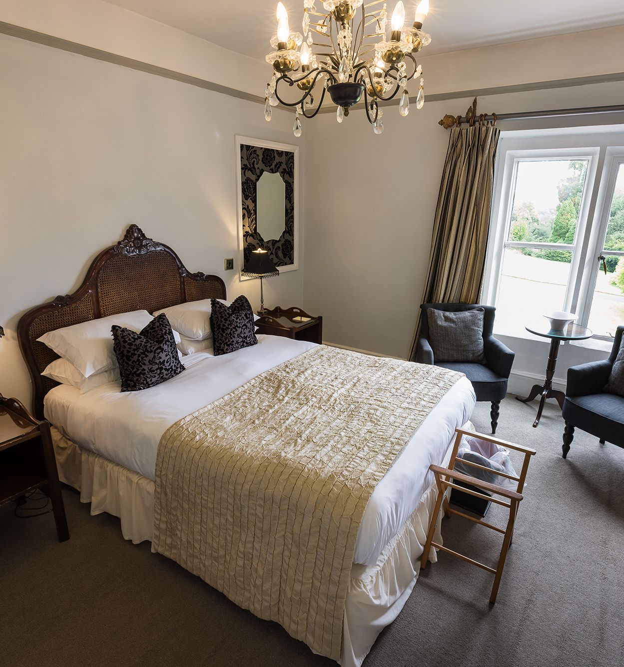 vintage style hotel room with statement mirrors