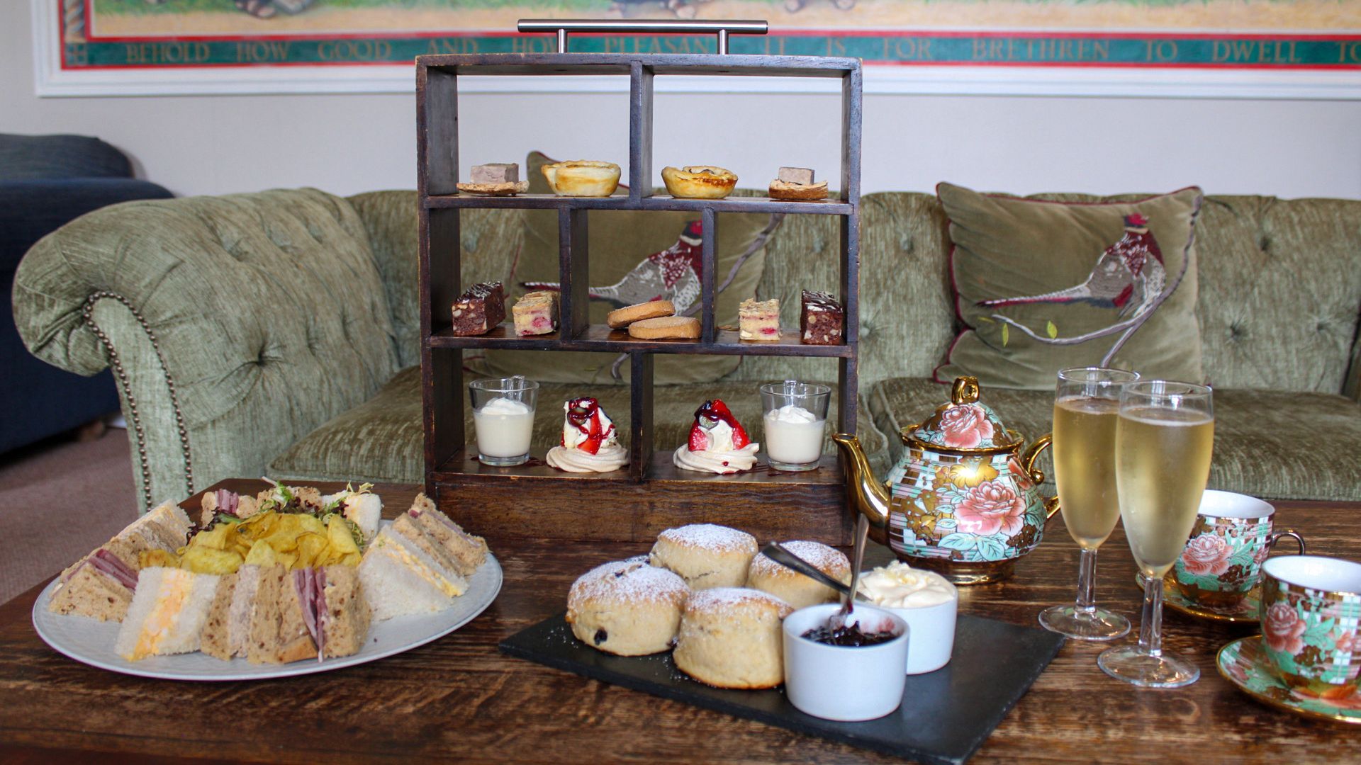 afternoon tea with scones, sandwiches, prosecco and small bites.