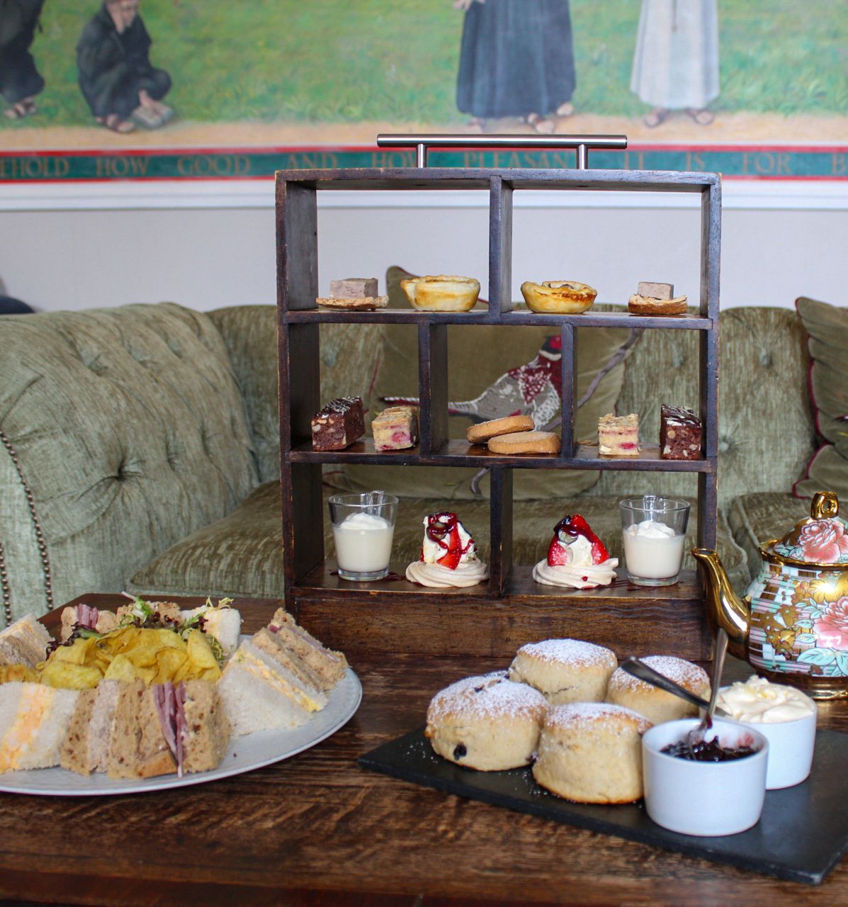 afternoon tea with scones, sandwiches, prosecco and small bites.