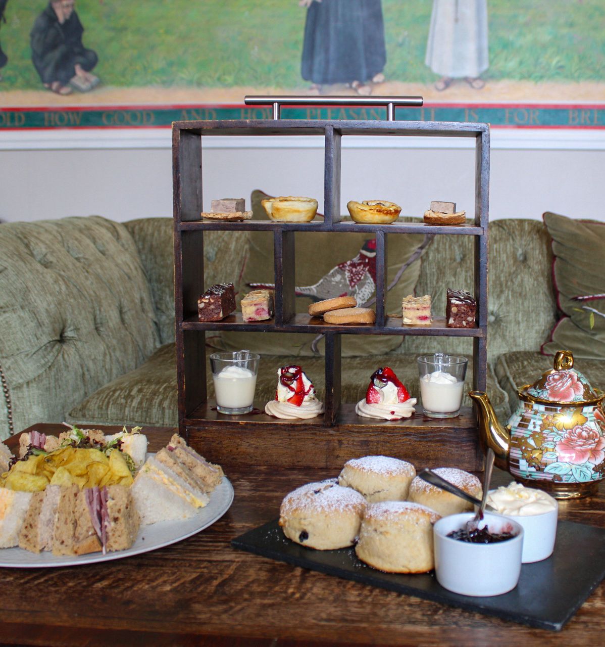 afternoon tea with scones, sandwiches, prosecco and small bites.