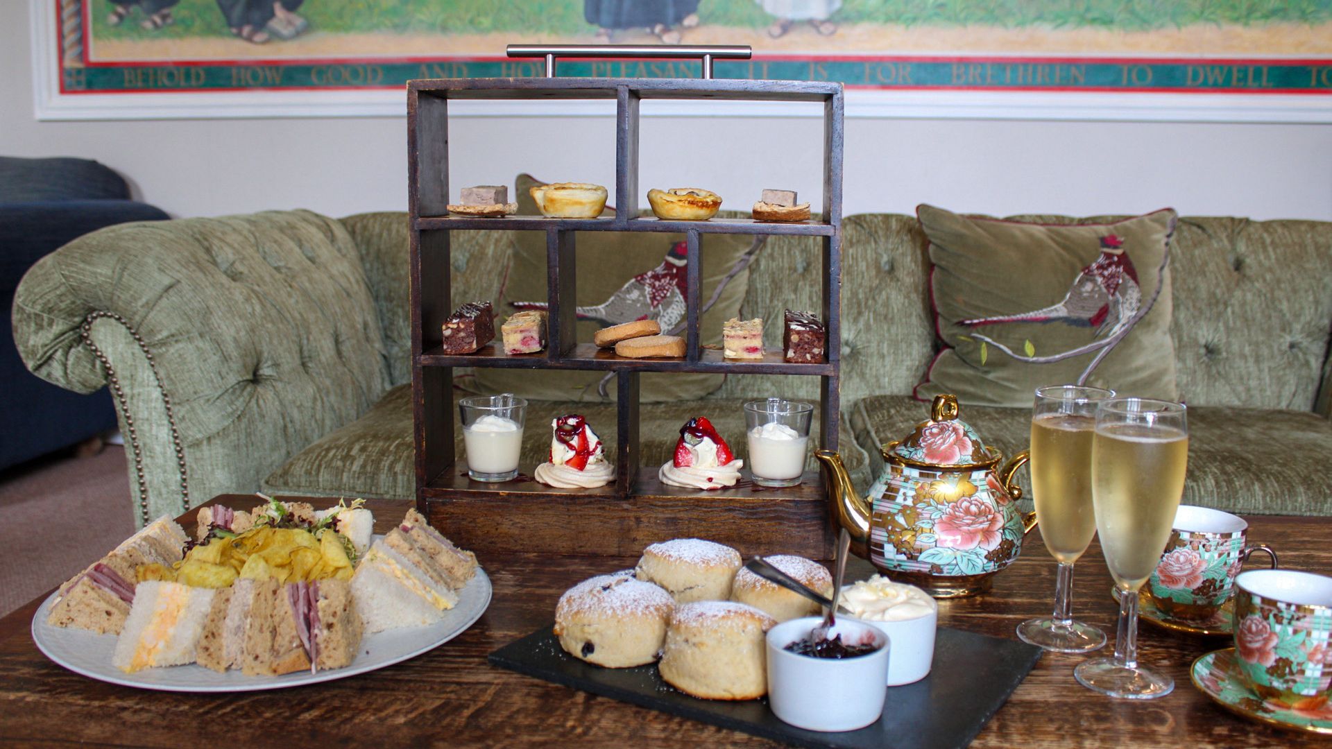 afternoon tea with scones, sandwiches, prosecco and small bites.