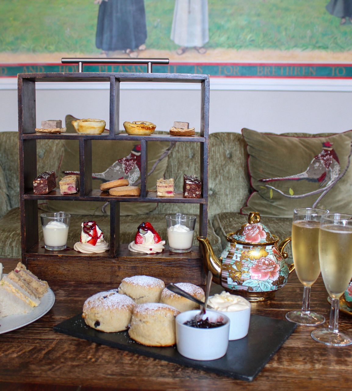 afternoon tea with scones, sandwiches, prosecco and small bites.
