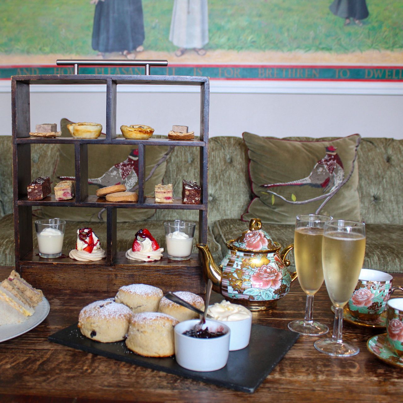 afternoon tea with scones, sandwiches, prosecco and small bites.