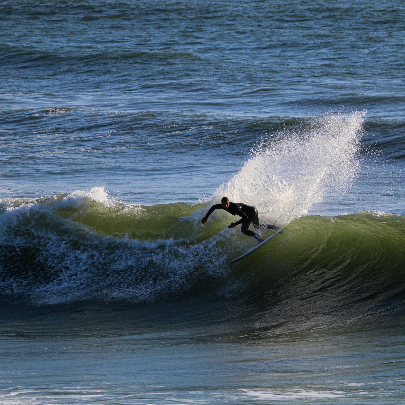 man surfing big wave