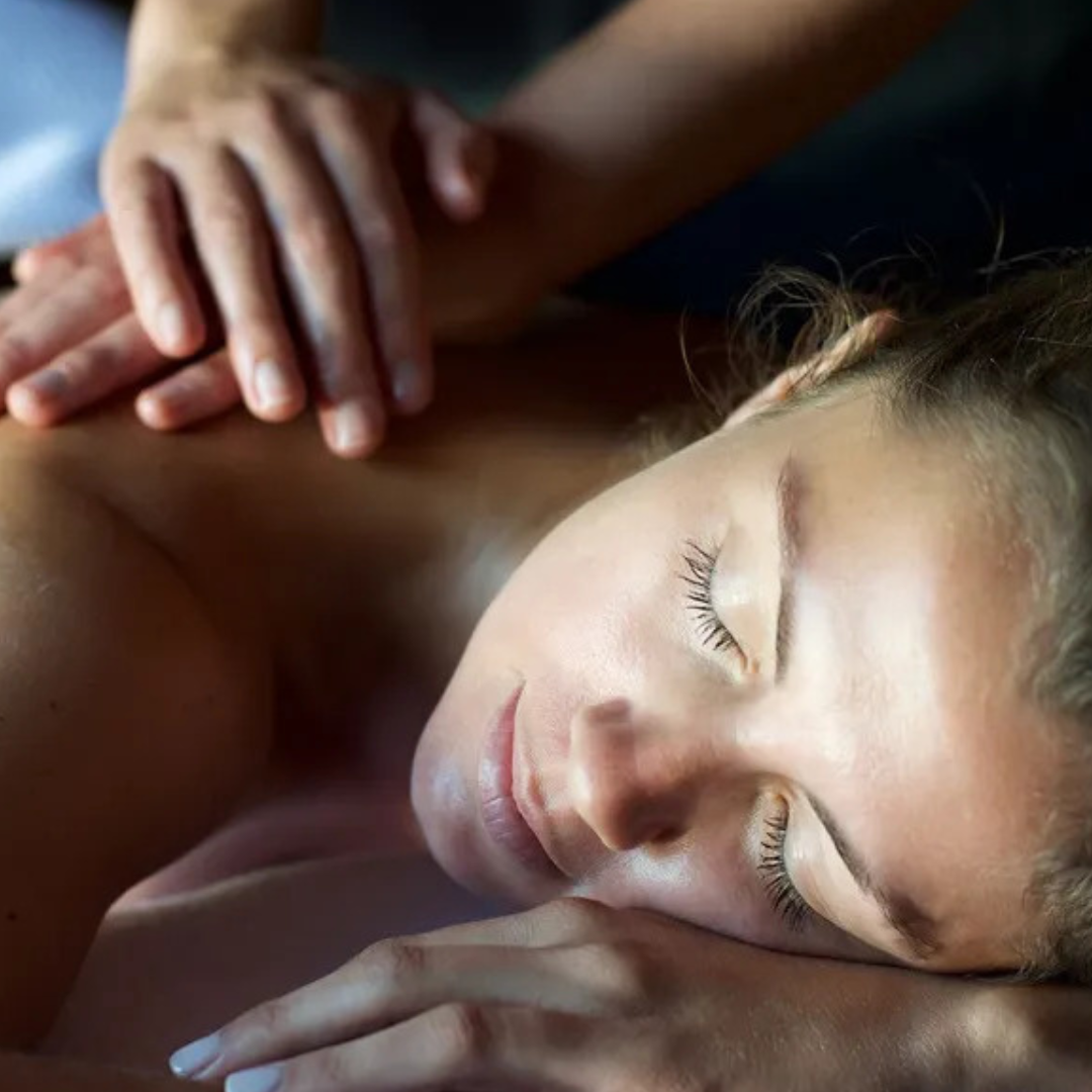 Person receiving a relaxing shoulder massage