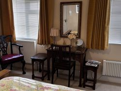 Bedroom 1 dressing table and mirroe and both windows