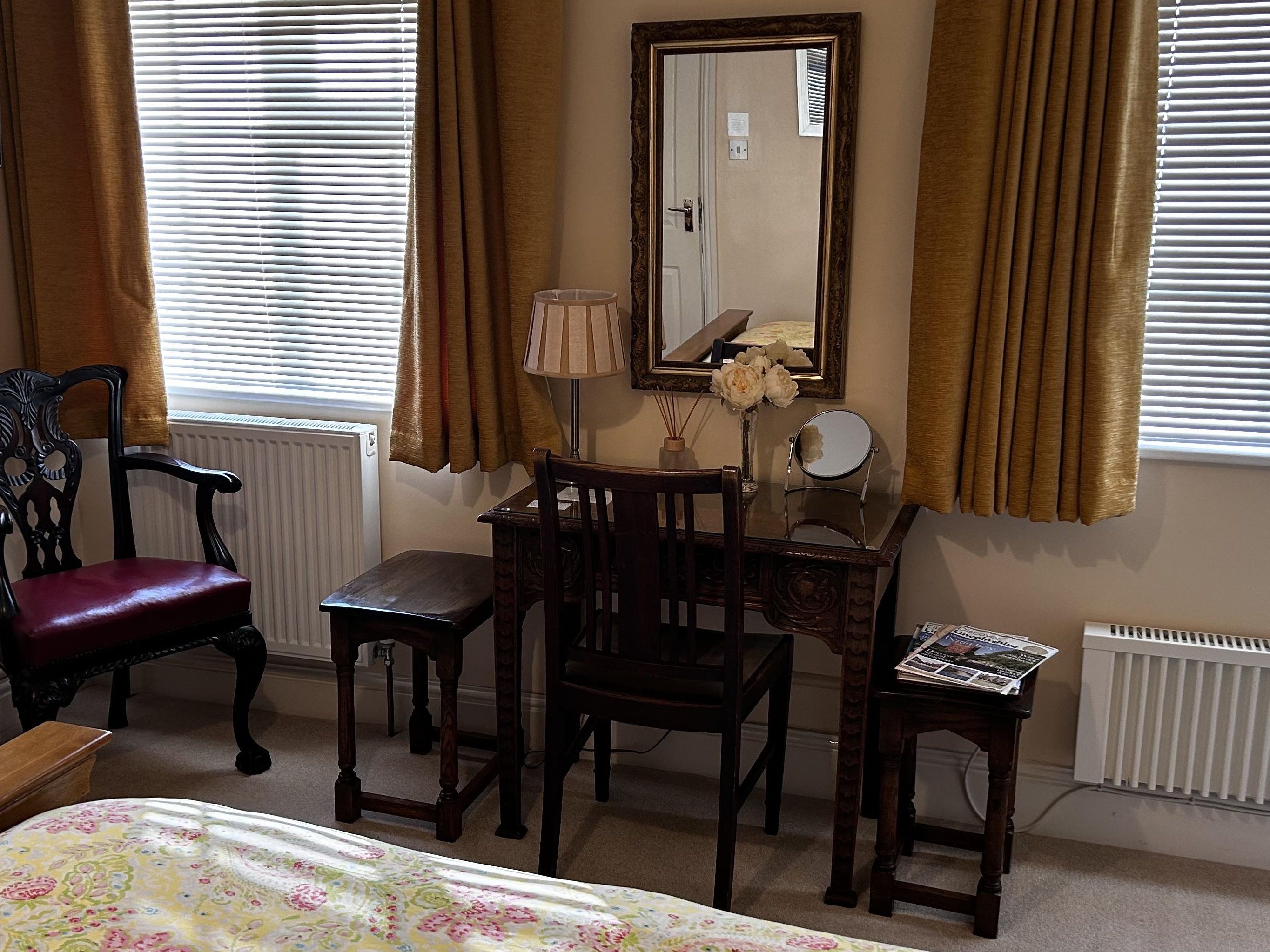 Bedroom 1 dressing table and mirroe and both windows