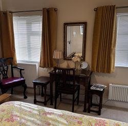 Bedroom 1 dressing table and mirroe and both windows